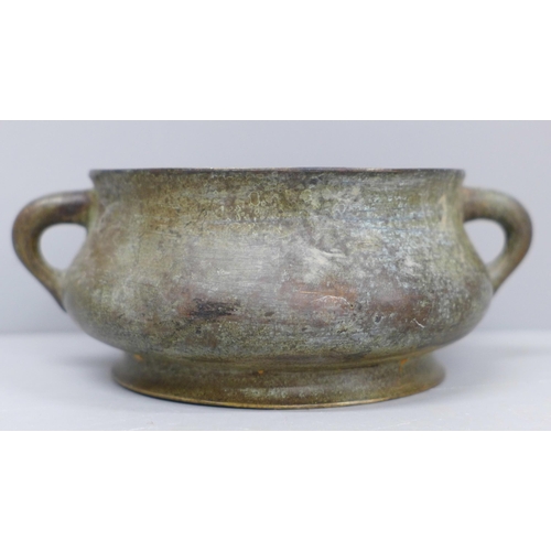 622 - A Chinese bronze incense burner censer, six character mark to base, 14cm wide