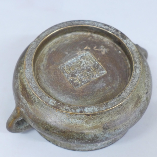622 - A Chinese bronze incense burner censer, six character mark to base, 14cm wide