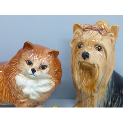 647 - A Beswick cat, a Sylvac dog and a collection of Wade Whimsies