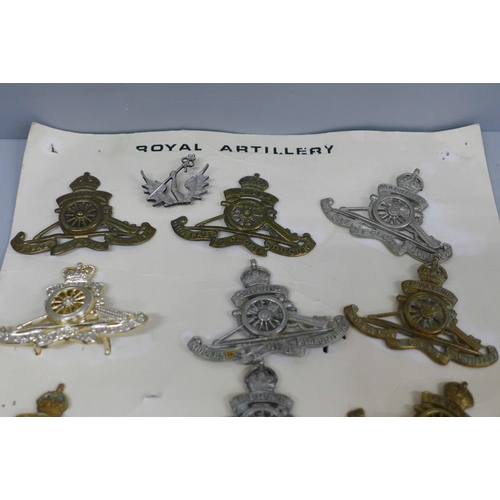 656 - A collection of Royal Artillery cap badges