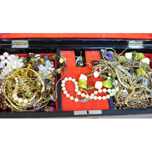 679 - Three boxes of costume jewellery