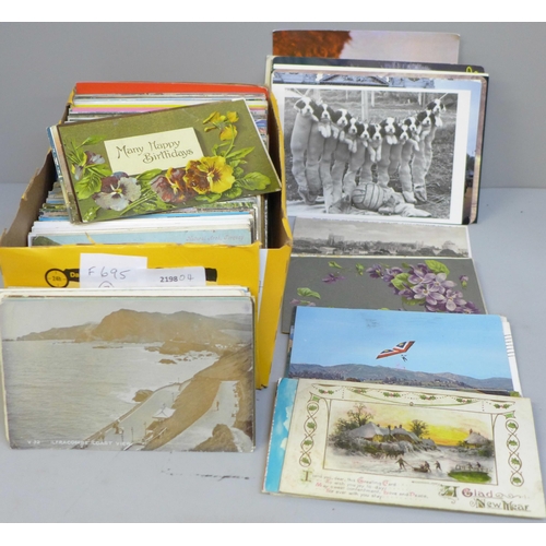 708 - Postcards; a box of postcards, vintage to modern