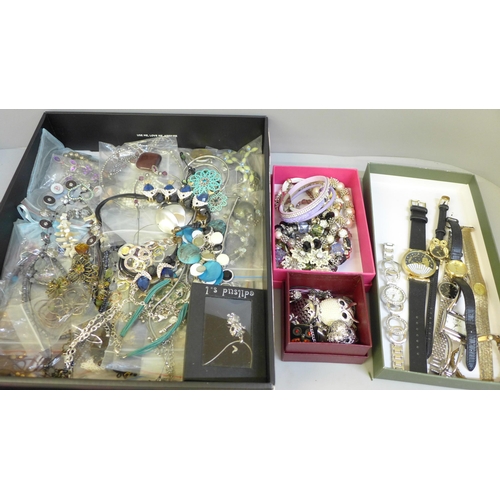 711 - A box containing 55 necklaces, a pendant, lady's wristwatches, owl brooches and a pendant watch