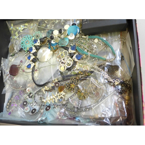 711 - A box containing 55 necklaces, a pendant, lady's wristwatches, owl brooches and a pendant watch