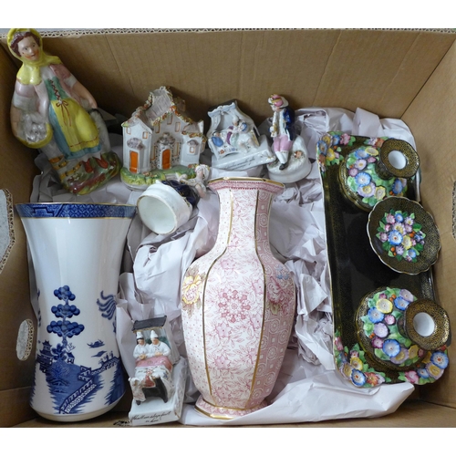 715 - A Royal Doulton blue and white Willow pattern vase, a Mason's Empress vase and Staffordshire figures... 