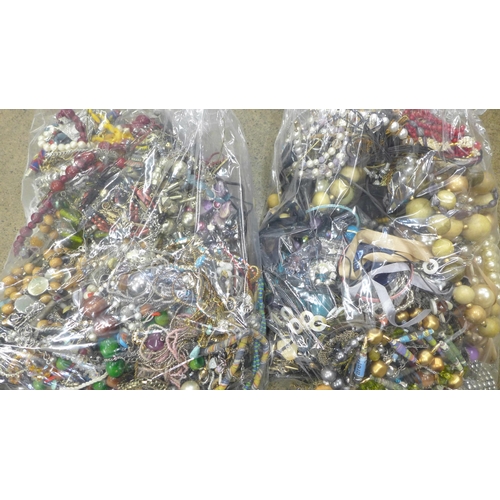 724 - Two large bags of costume jewellery