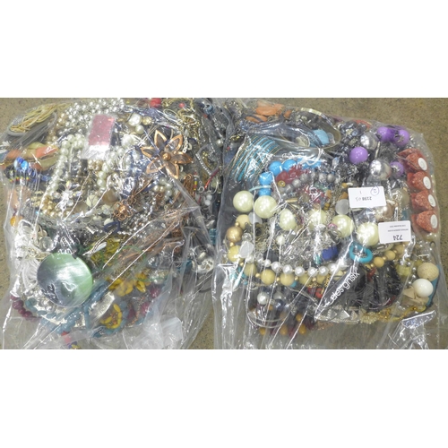 724 - Two large bags of costume jewellery