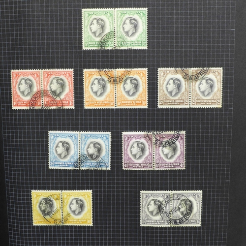 728 - Stamps; Commonwealth Omnibus stamps in two albums with many King George VI Coronation onwards