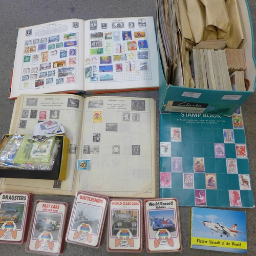 732 - A collection of stamp albums, Top Trumps, Brooke Bond Tea cards, cigarette cards, etc.