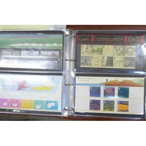 747 - Four albums of stamps, approximately 120 Royal Mail presentation packs, 20 Year packs and Royal comm... 