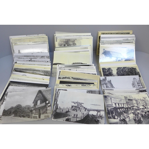 752 - A large collection of over 400 original real photo postcards covering many topographical themes from... 