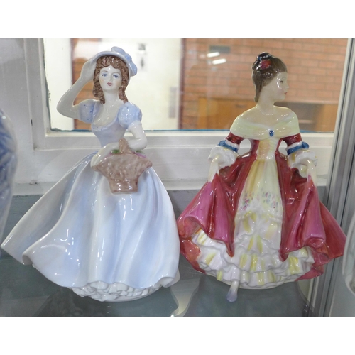 781 - A Royal Doulton figure, Southern Belle, HN2229, a Coalport Ladies of Fashion Christmas figure, a gla... 