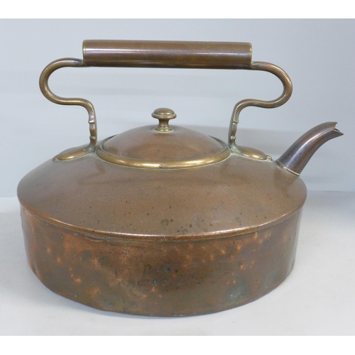 790 - A Victorian large flat bottomed copper kettle