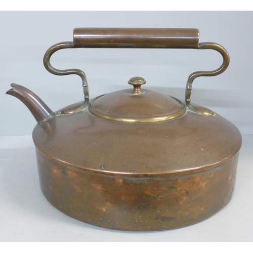 790 - A Victorian large flat bottomed copper kettle