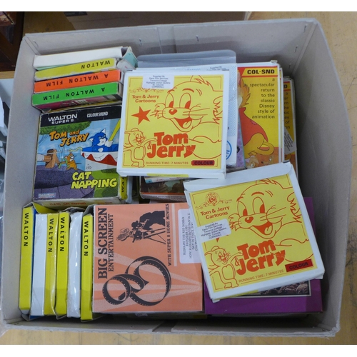 808A - A box of Walton Super 8 films, mainly Tom and Jerry cartoons, approximately 40