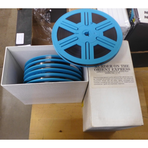 808C - A box of Super 8 film reels, That's Entertainment, An American in Paris, Singin' In The Rain, etc., ... 