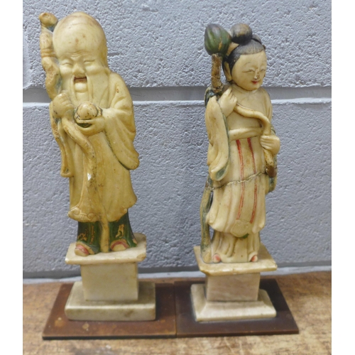 827 - Two Chinese carved alabaster figures, Han Dynasty, one broken in two and repaired, tallest 42cm