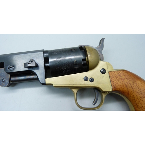 842 - A replica Colt Navy cap and ball pistol, made in Italy and a replica Confederate belt buckle, CS