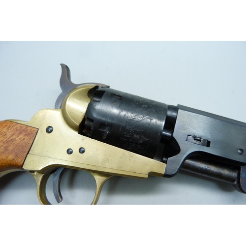 842 - A replica Colt Navy cap and ball pistol, made in Italy and a replica Confederate belt buckle, CS