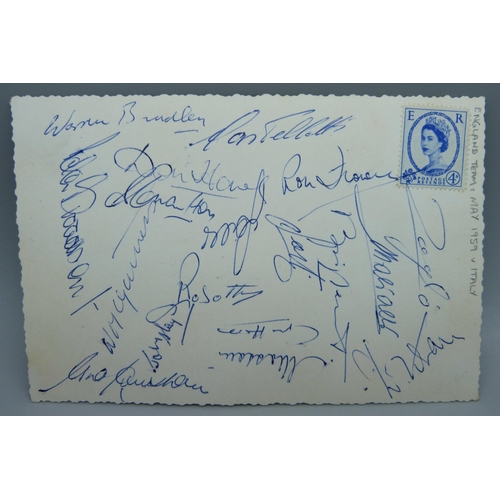 857 - Football autographs, England a black and white postcard showing the England team that played Italy a... 