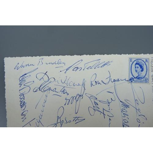 857 - Football autographs, England a black and white postcard showing the England team that played Italy a... 