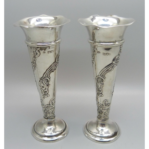 866 - A pair of William Comyns vases, London 1904, 13cm, weighted