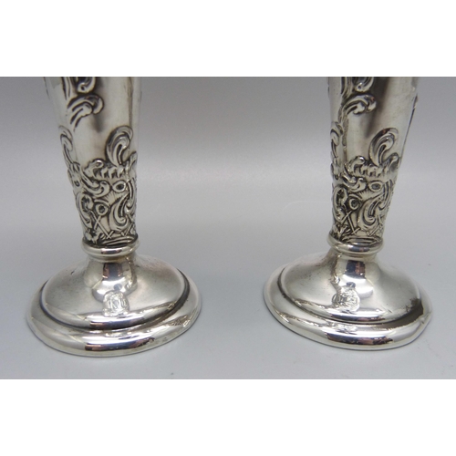 866 - A pair of William Comyns vases, London 1904, 13cm, weighted