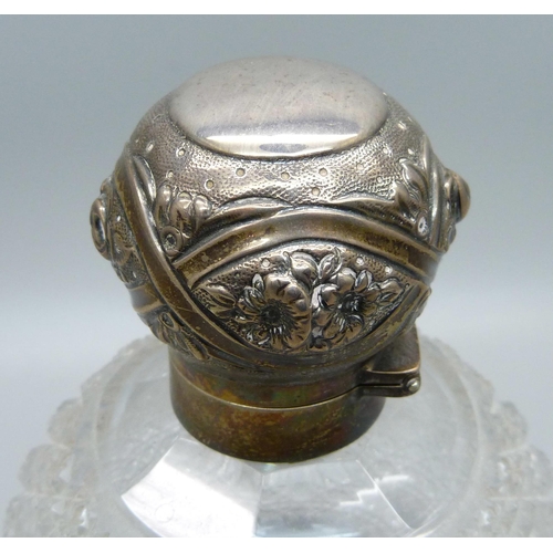 870 - A Victorian silver globular cut glass perfume bottle, London 1892, marked Mappin & Webb, 13cm, with ... 