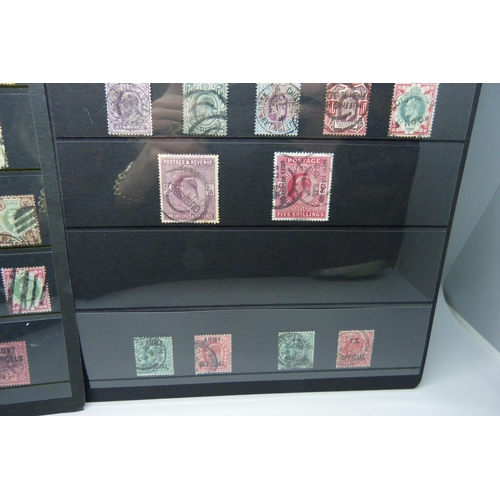 876 - Stamps; GB Queen Victoria and Edward VII stamps with values to five shillings, on two stock sheets