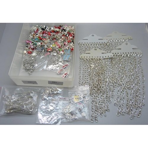 881 - A collection of forty bracelets and a large collection of novelty charms