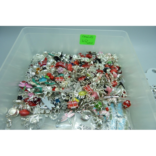 881 - A collection of forty bracelets and a large collection of novelty charms