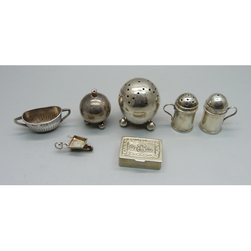 883 - A small hallmarked silver pepper, a hallmarked silver miniature sugar bowl, a miniature 925 silver s... 