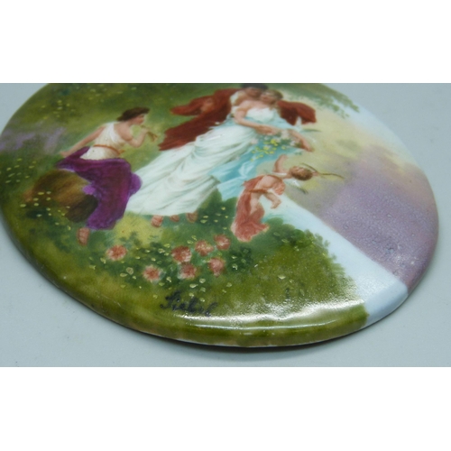 887 - A domed oval German hand painted porcelain plaque, entitled, Arbend, signed Siebel, 93mm wide