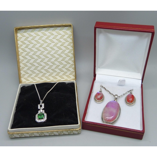 894 - A silver and pink stone set pendant and chain and earrings set, and a silver, green and white stone ... 