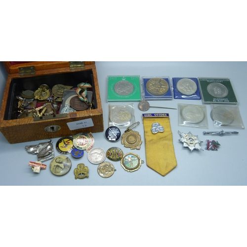 906 - A leather jewellery box containing coins, medallions, badges, etc., (replica 8 Reales coin)