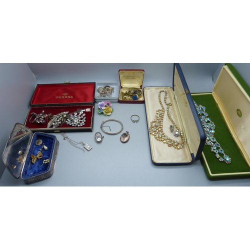 916 - A collection of costume jewellery including a silver cocktail wristwatch head, and a plated box