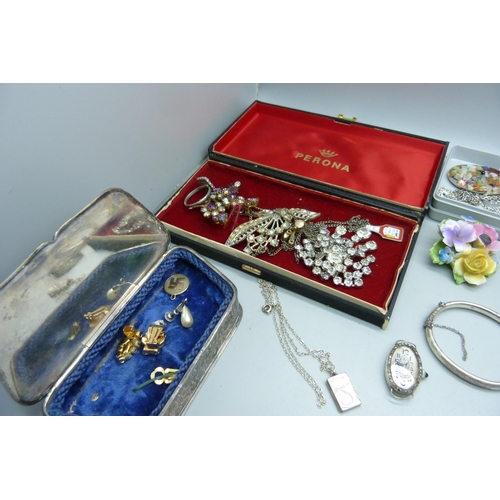 916 - A collection of costume jewellery including a silver cocktail wristwatch head, and a plated box