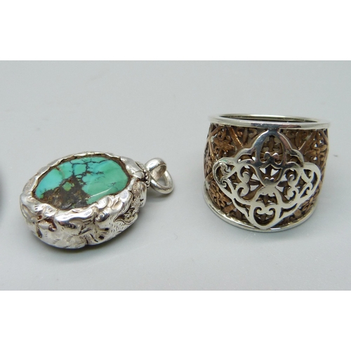942 - A hallmarked silver bangle, a turquoise pendant, (tests as silver) and a ring, O, (tests as silver a... 