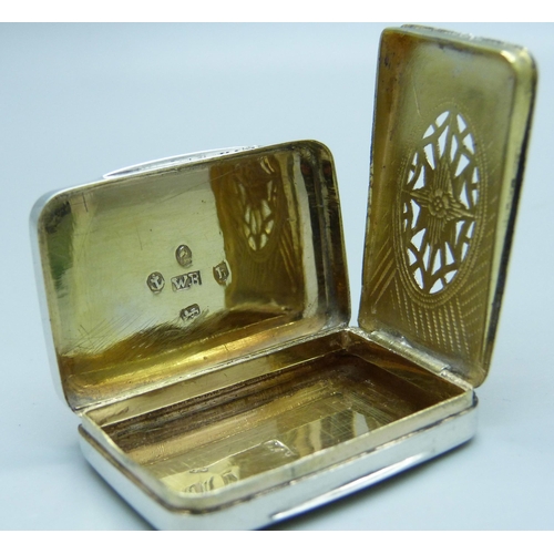 943 - A George III silver vinaigrette with unusual grille, Birmingham 1805, William Boot, 41mm wide