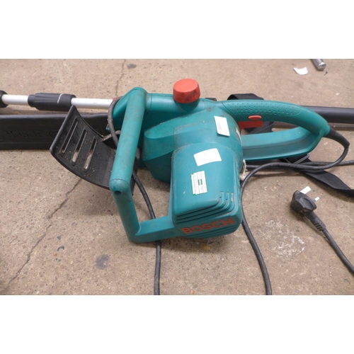 2005 - A Bosch long reach hedge trimmer(HB3000), Bosch (h34 47aa) electric chainsaw and black and decker ro... 