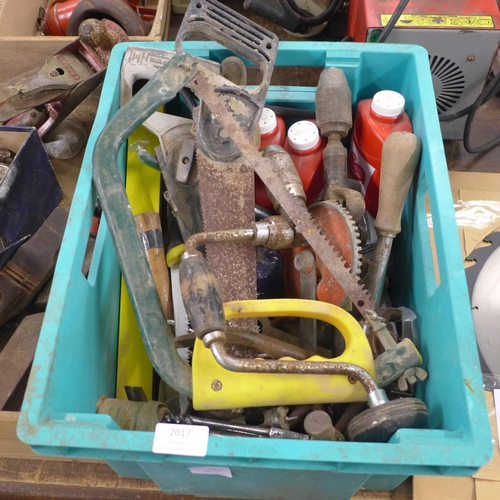 2017 - A box of assorted tools including saws, a braise drill, hammers, etc.