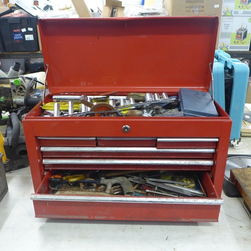 2032 - A red metal toolbox with sliding drawers including a quantity of mixed tools including sockets, scre... 