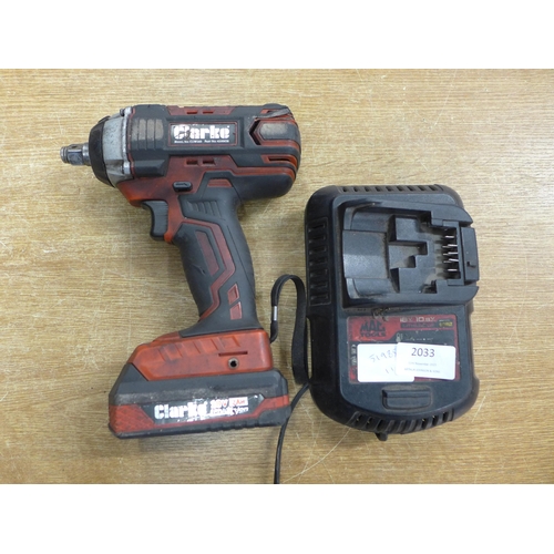 2033 - A Clarke 18v cc1w160 impact drill with charger -w
