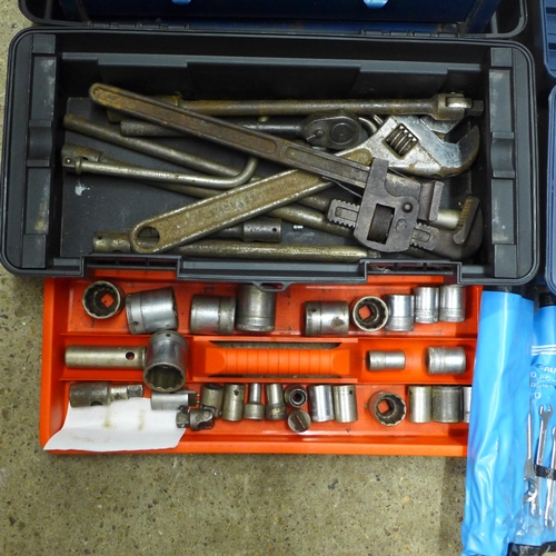 2042 - Two plastic tool boxes including an assortment of tools including a quantity of spanners, a small wo... 
