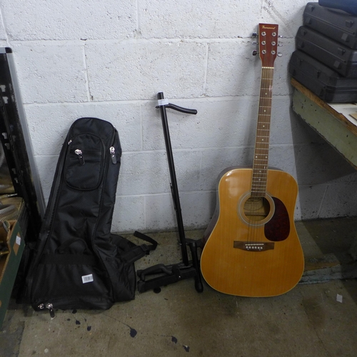 2052 - A guitar, a stand and guitar bags