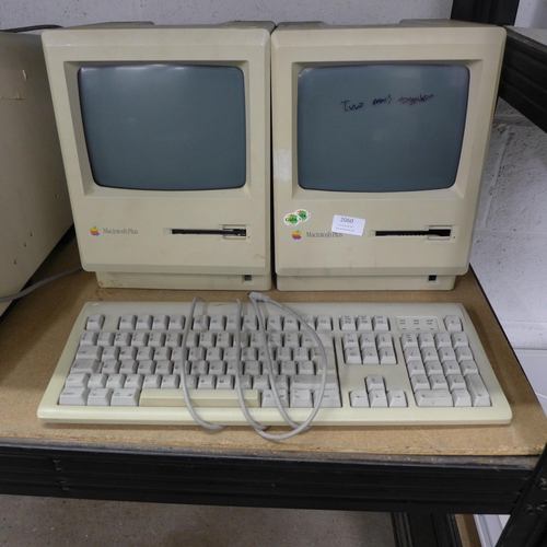 2060 - Two Apple Macintosh Plus 1MB computers and an Apple Design keyboard