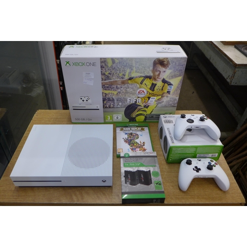 2107 - A Microsoft XBox One Console with two controllers and one game- in box