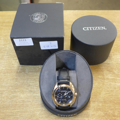 2111 - A Citizen Eco-drive watch with black leather strap