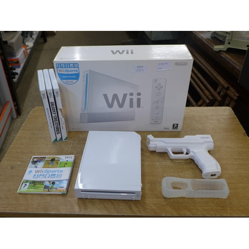 2117 - A Nintendo Wii gaming console with accessory's and 4 games- boxed