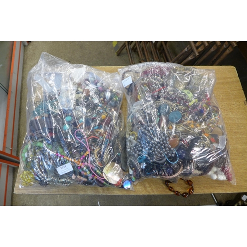 2124 - Two large bags of costume jewellery